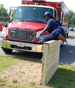 Image of a Fire Department employee going over the Barrier Station.